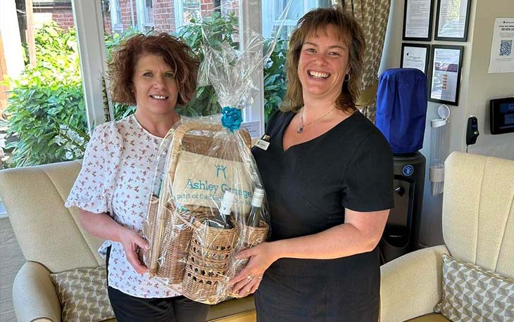 Winner receiving her hamper